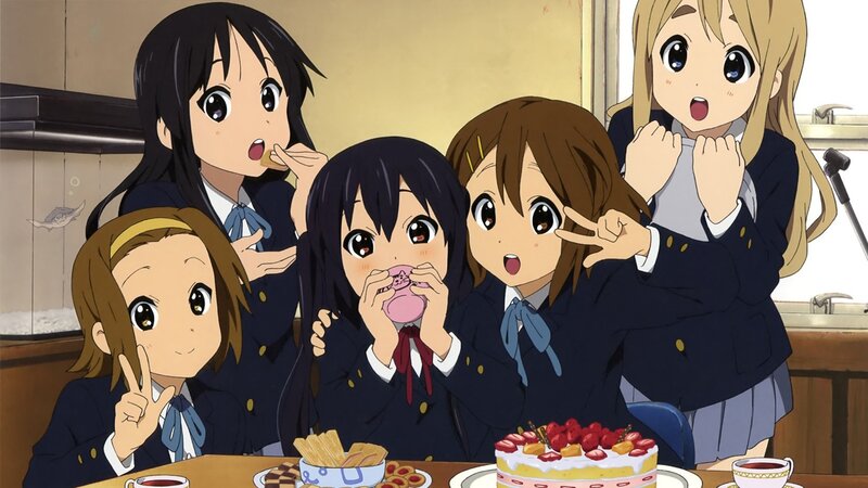 Schoolgirls enjoying a cake party