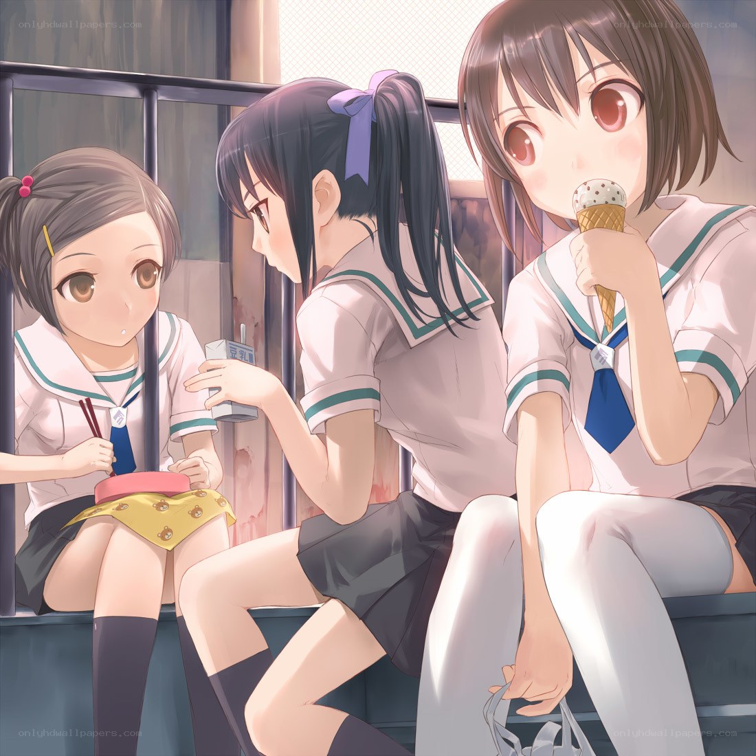 Schoolgirls enjoying snacks