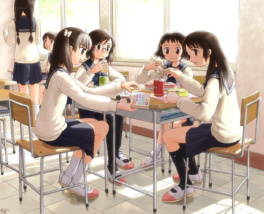 Schoolgirls having lunch together