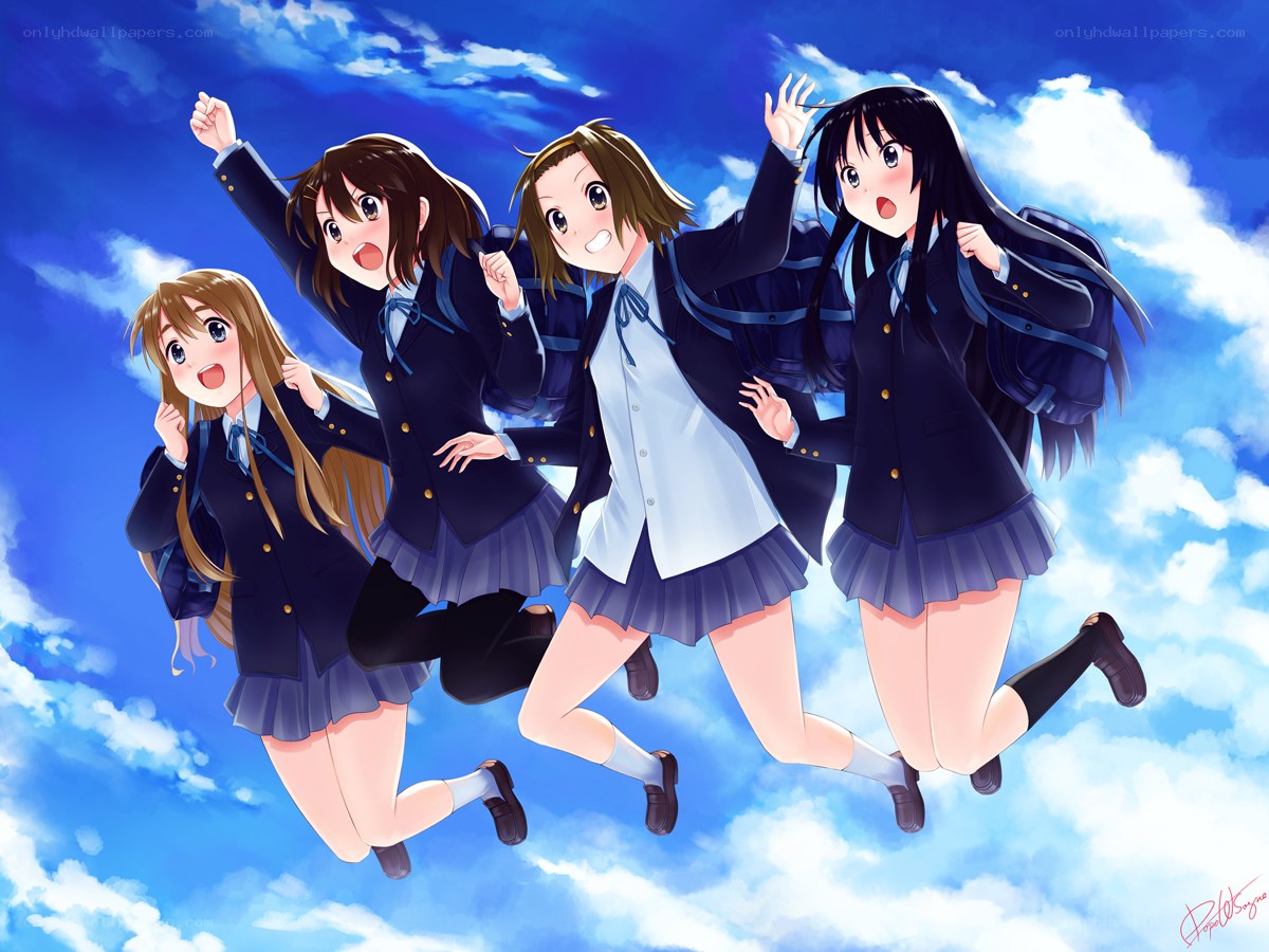 schoolgirls jumping in the sky
