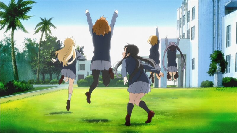 Schoolgirls Jumping on Grass