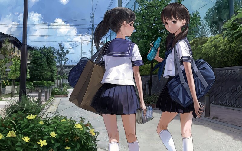 schoolgirls walking on a sunny day