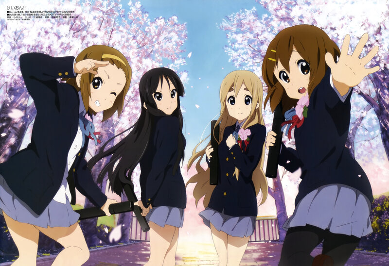 Schoolgirls with batons in cherry blossom