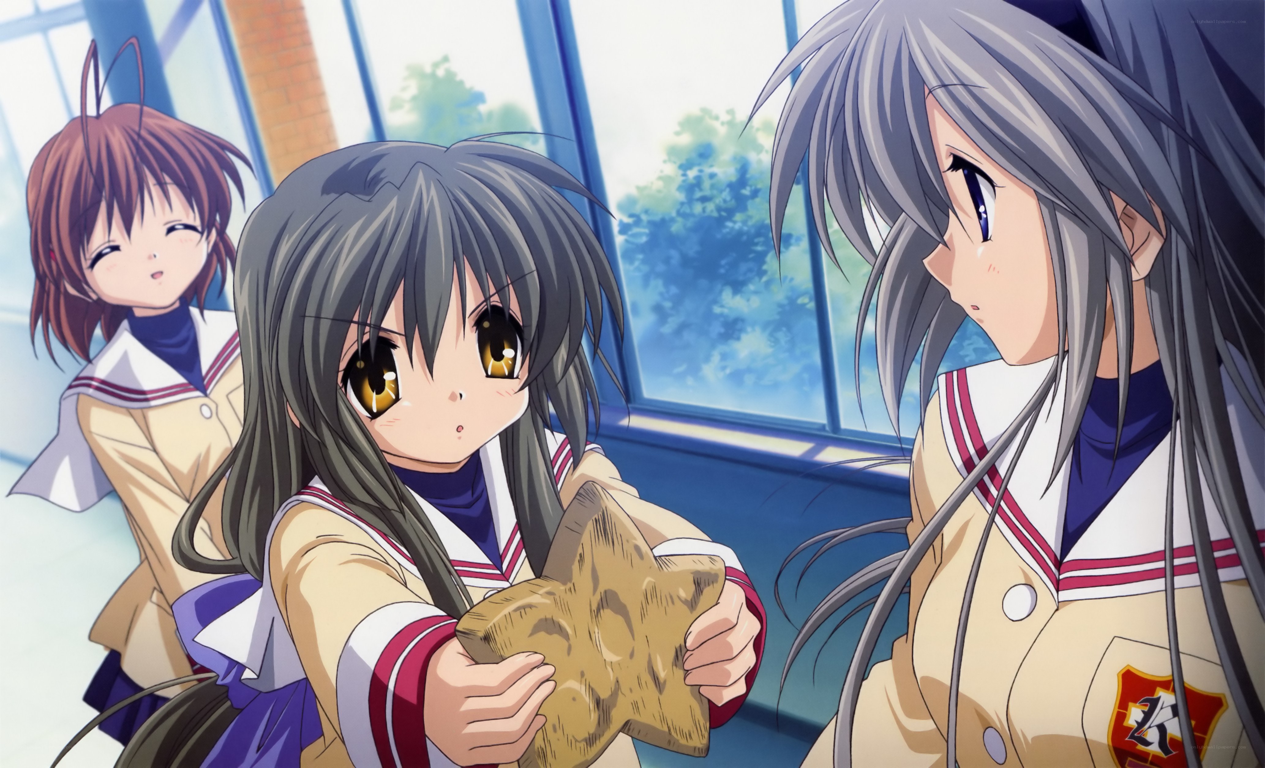 schoolgirls with star-shaped object
