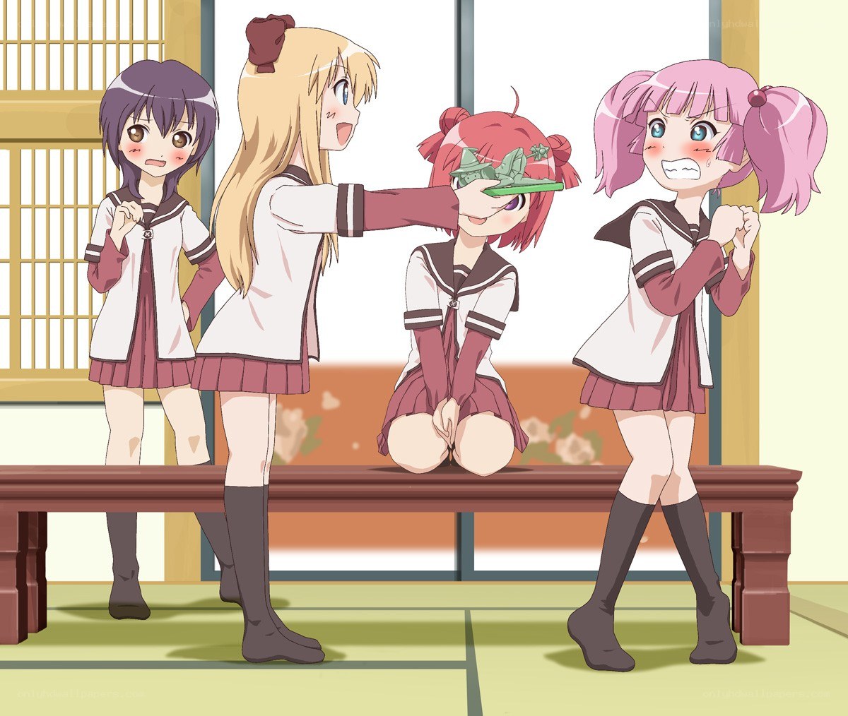 Schoolgirls with toy ship