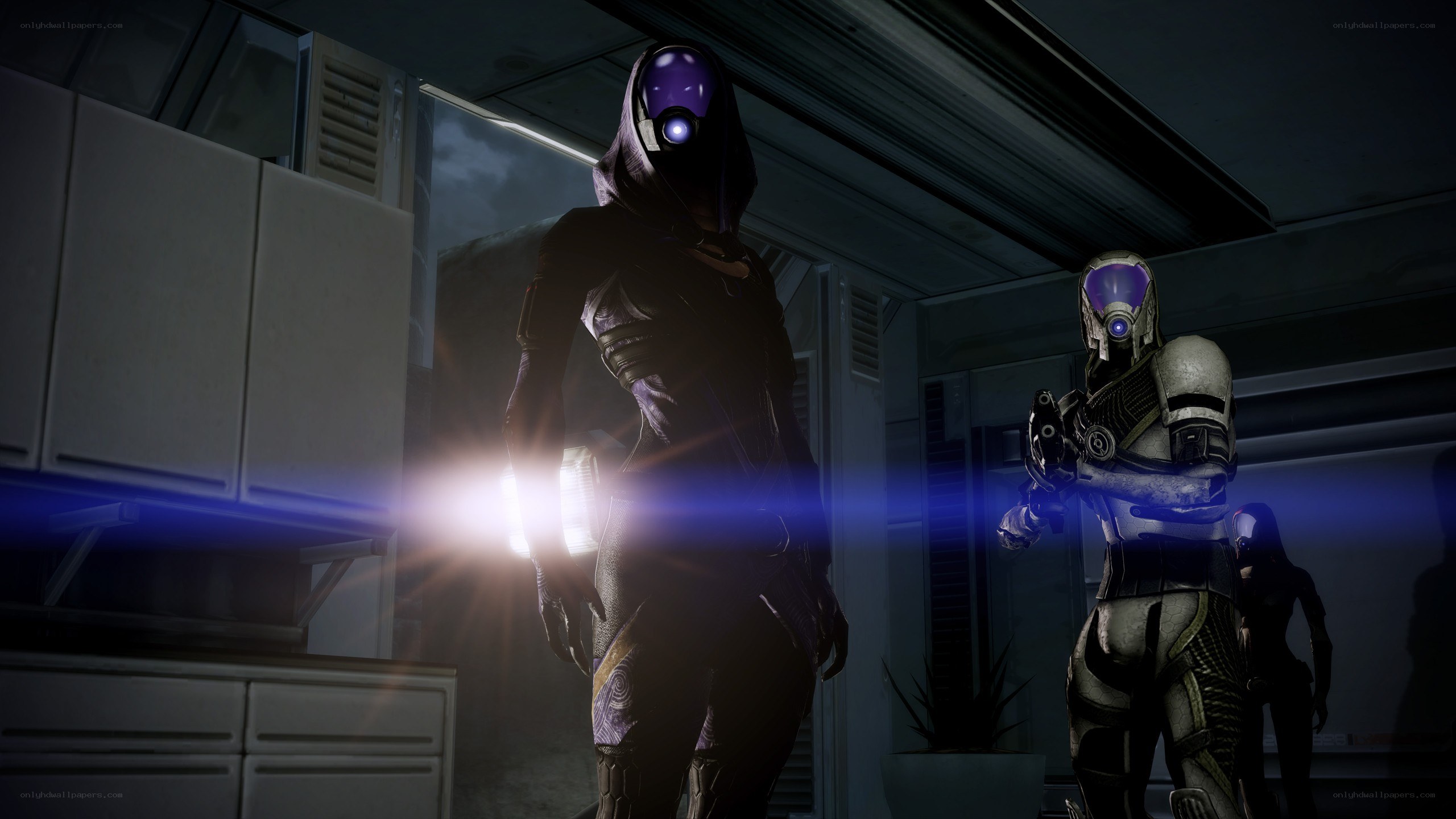 sci-fi characters in a dim room