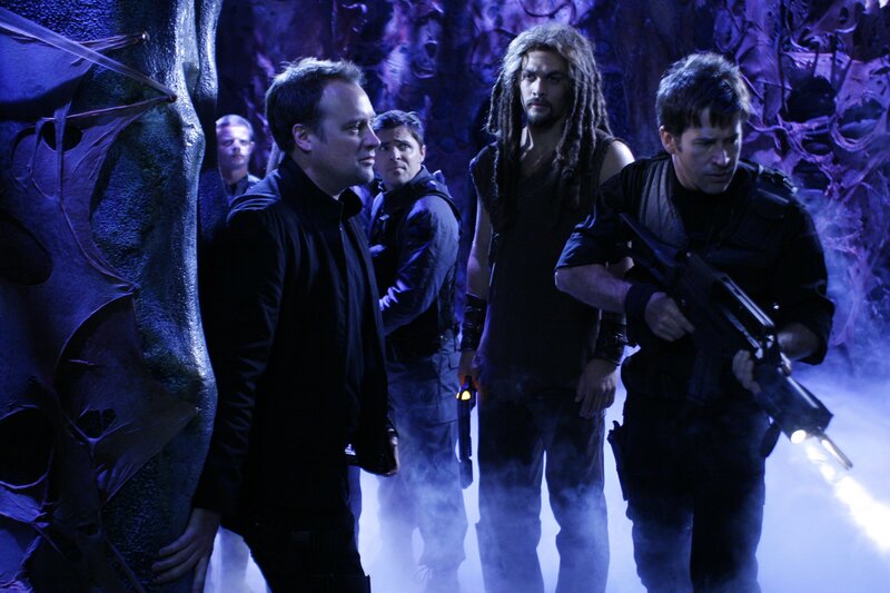 sci-fi team in alien corridor