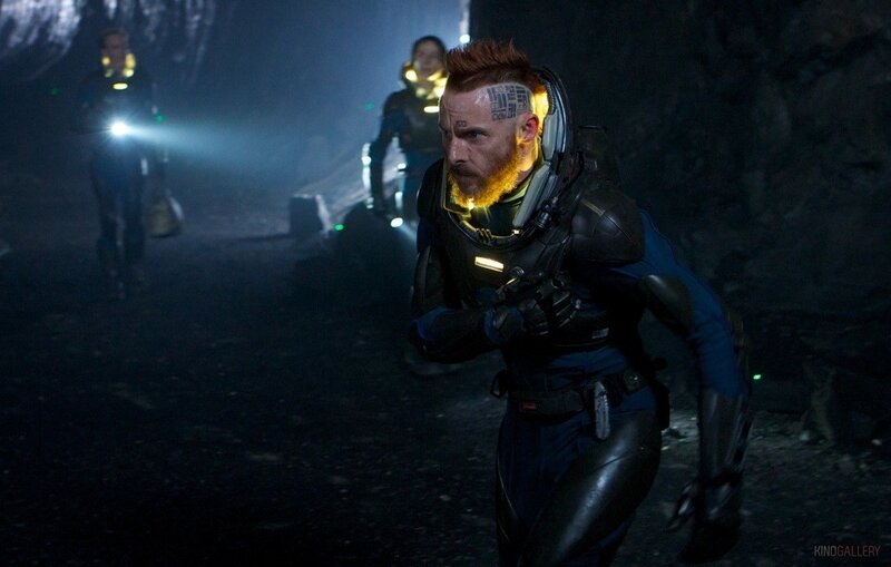 sci-fi team in dark tunnel
