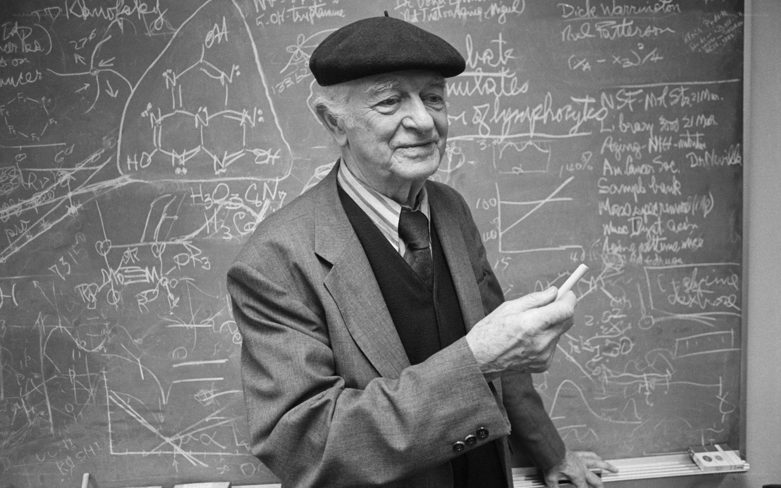 Scientist at a chalkboard