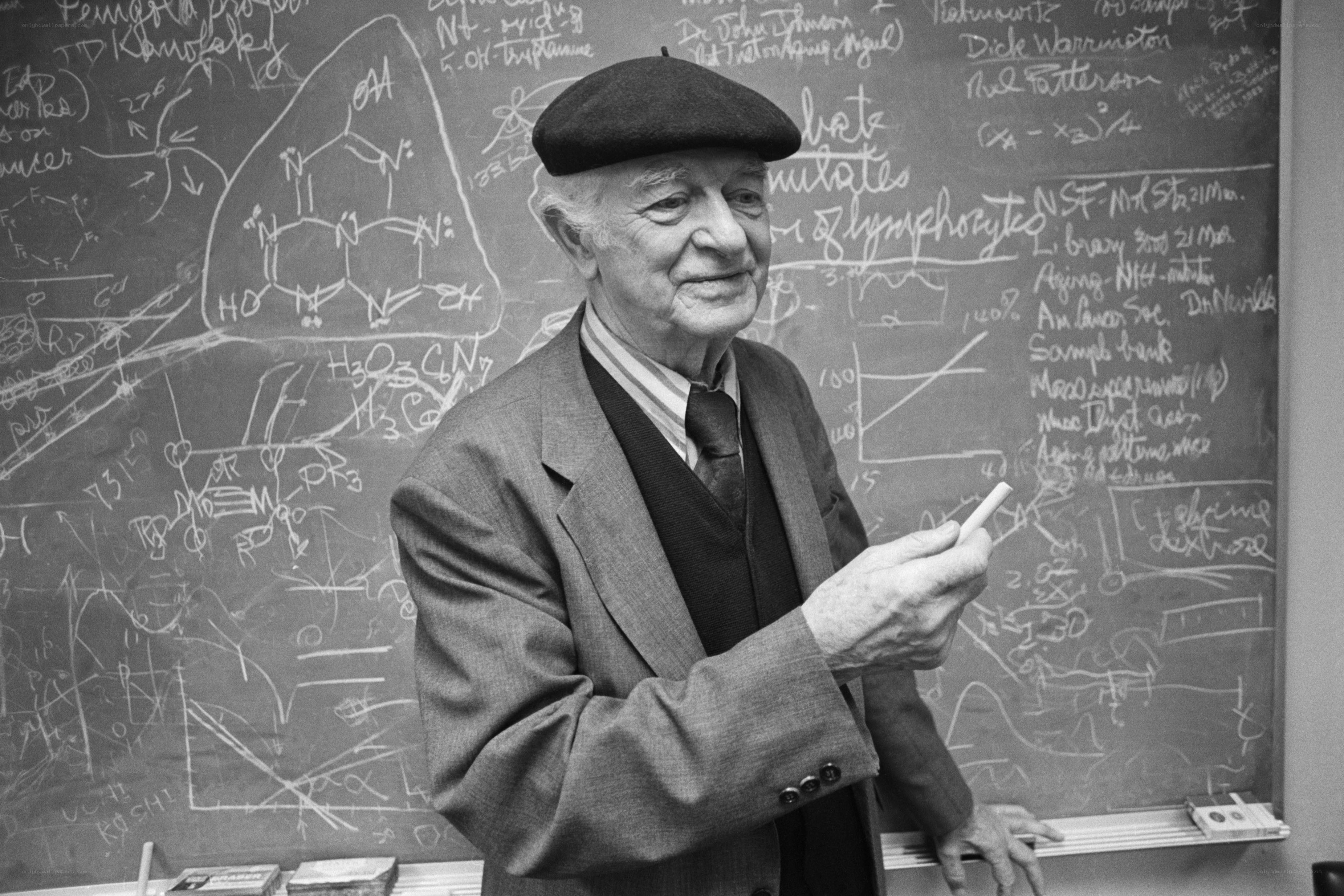Scientist at a chalkboard