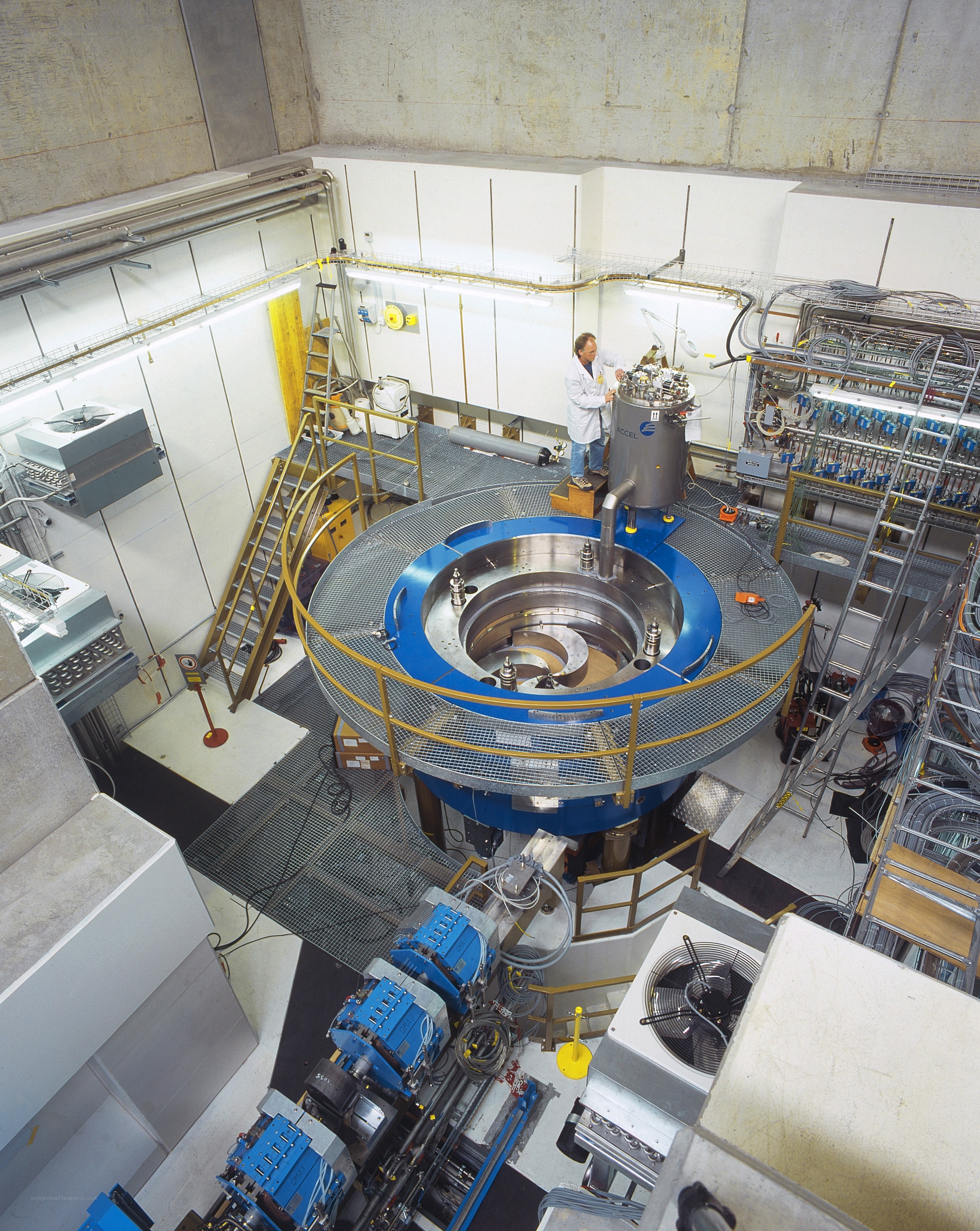 Scientist at a large scientific instrument