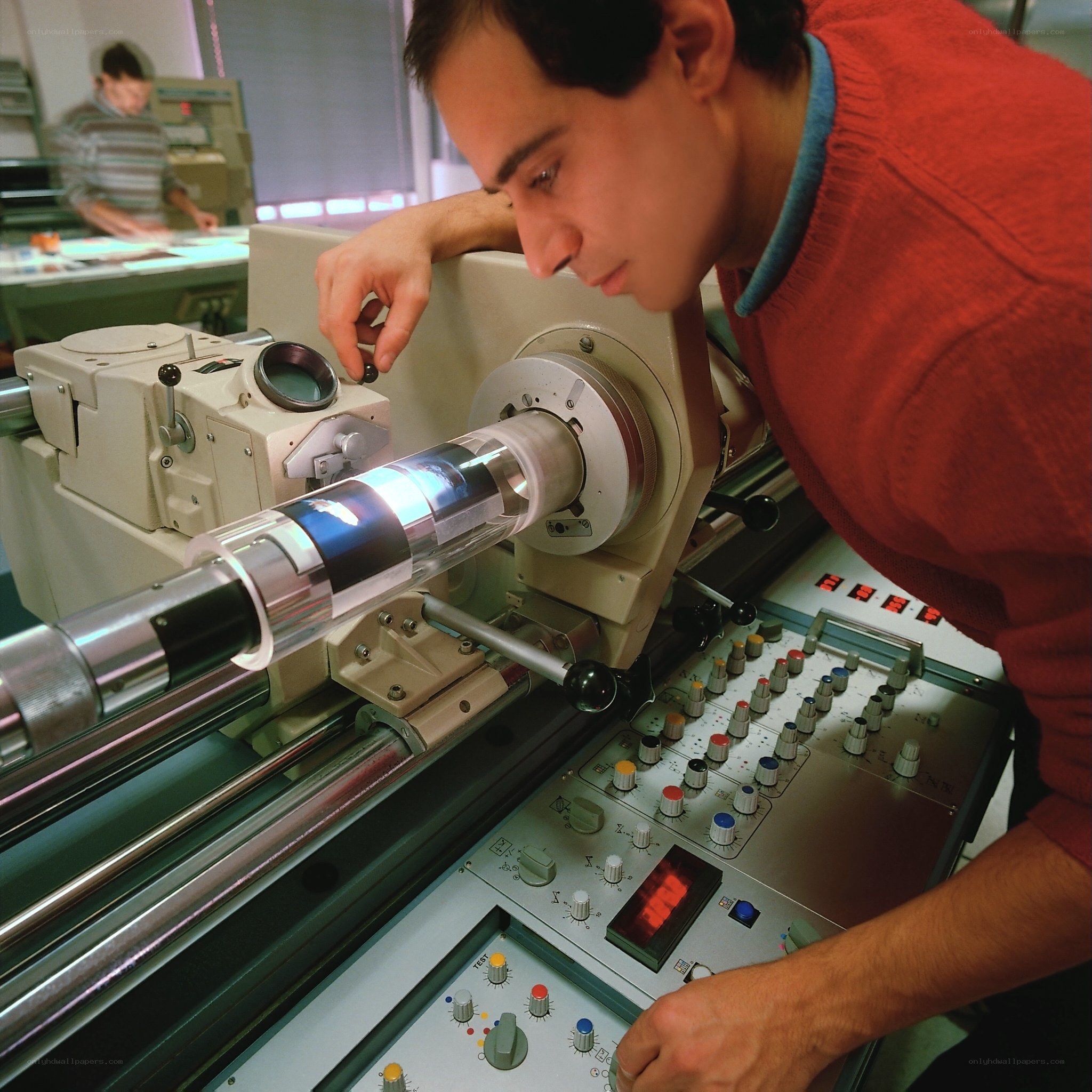 Scientist operating scientific equipment