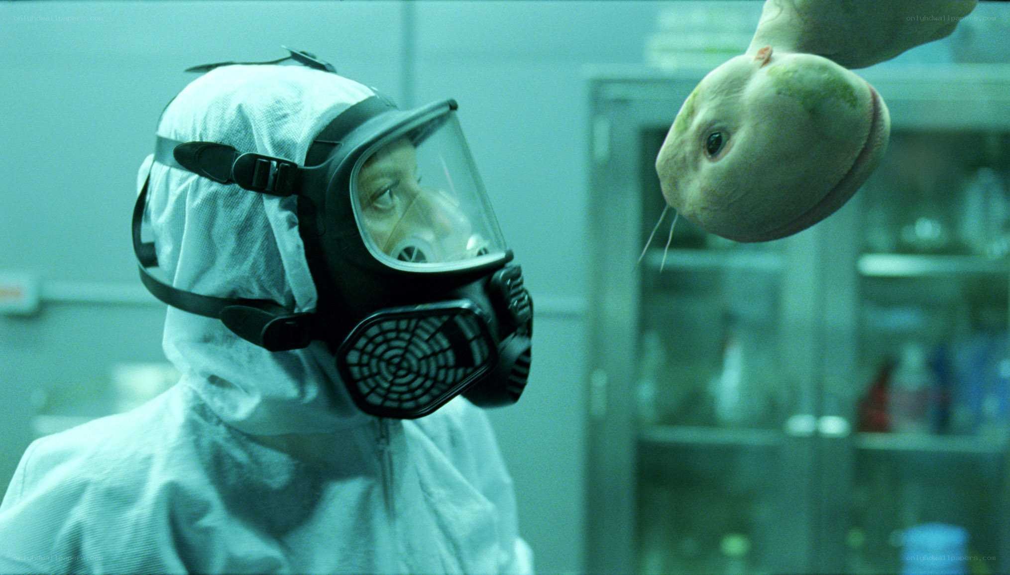 scientist with gas mask and alien head