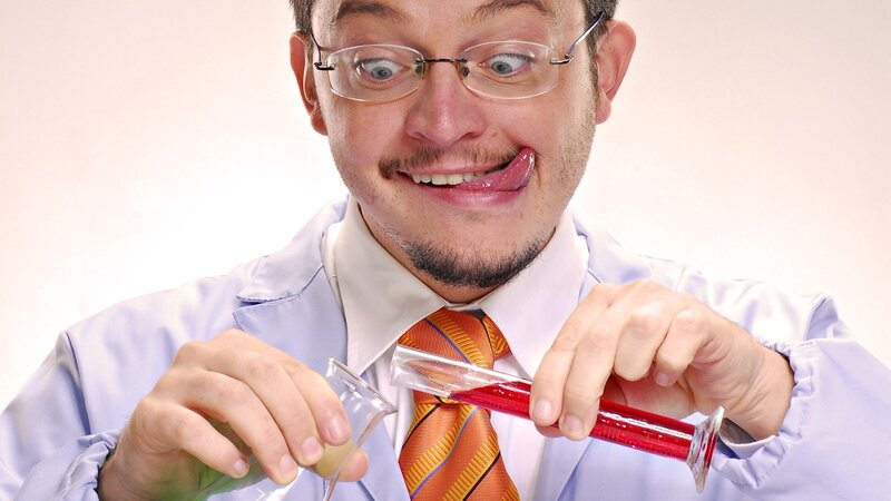 scientist with red liquid