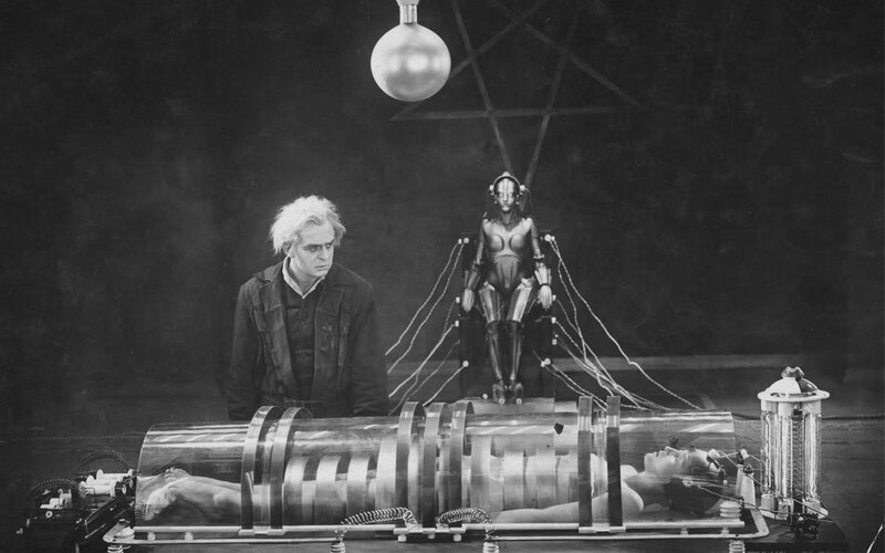 Scientist with robot and cyborg