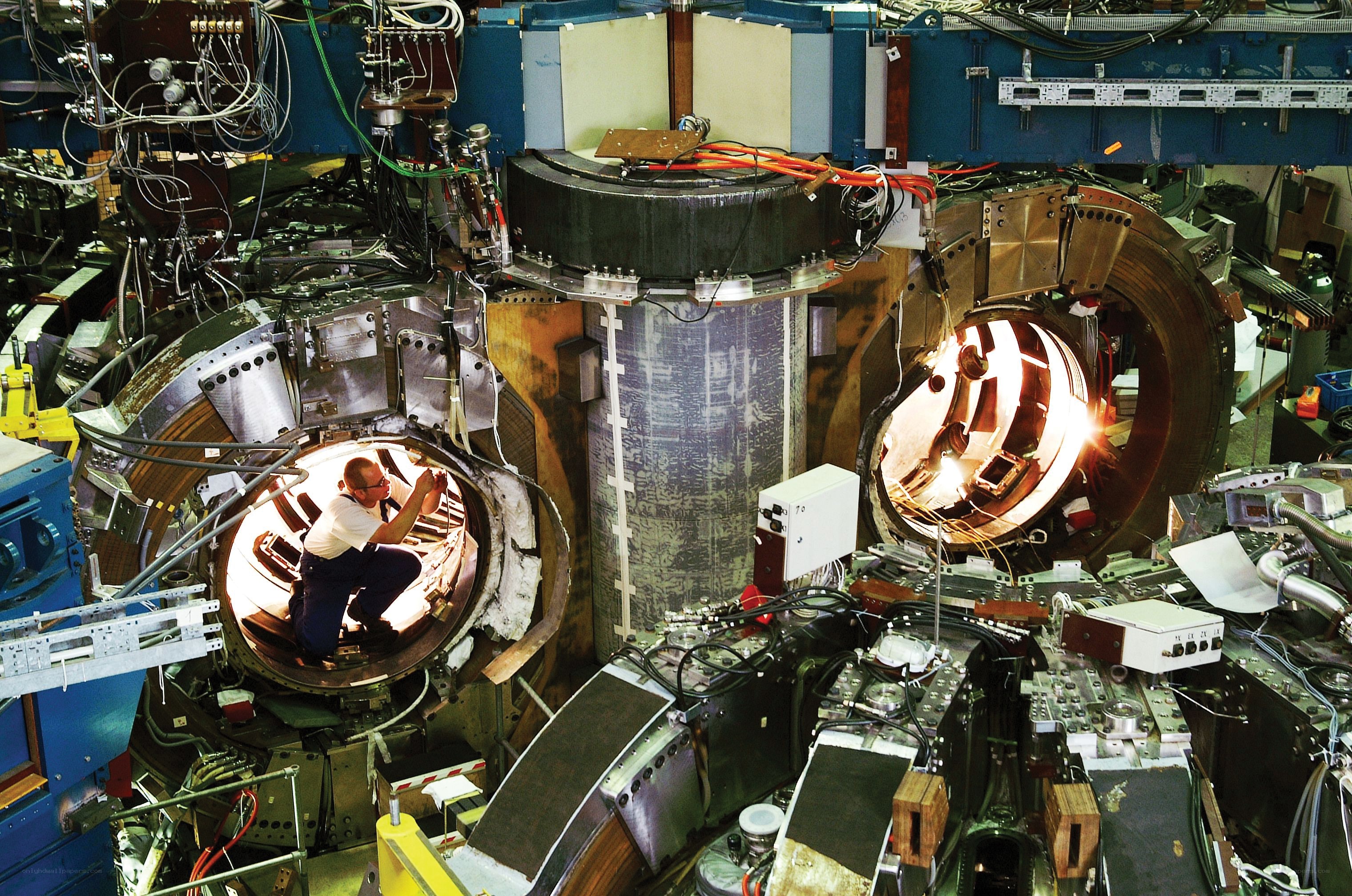 Scientist working on fusion reactor