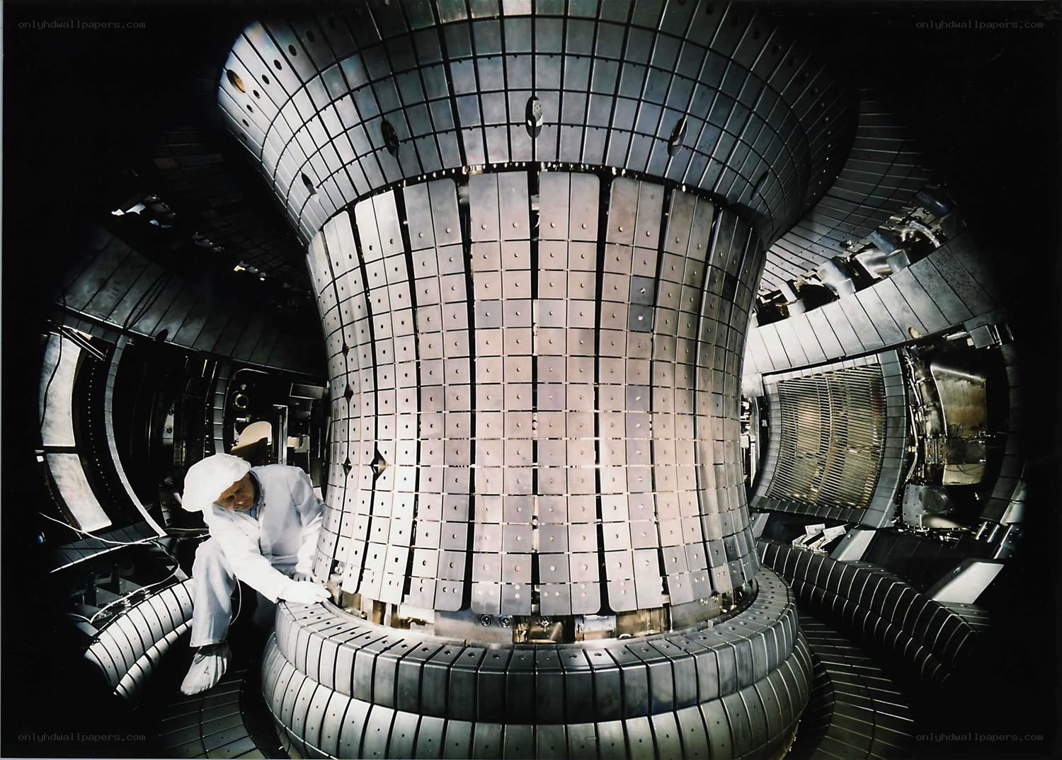 Scientist working on fusion reactor
