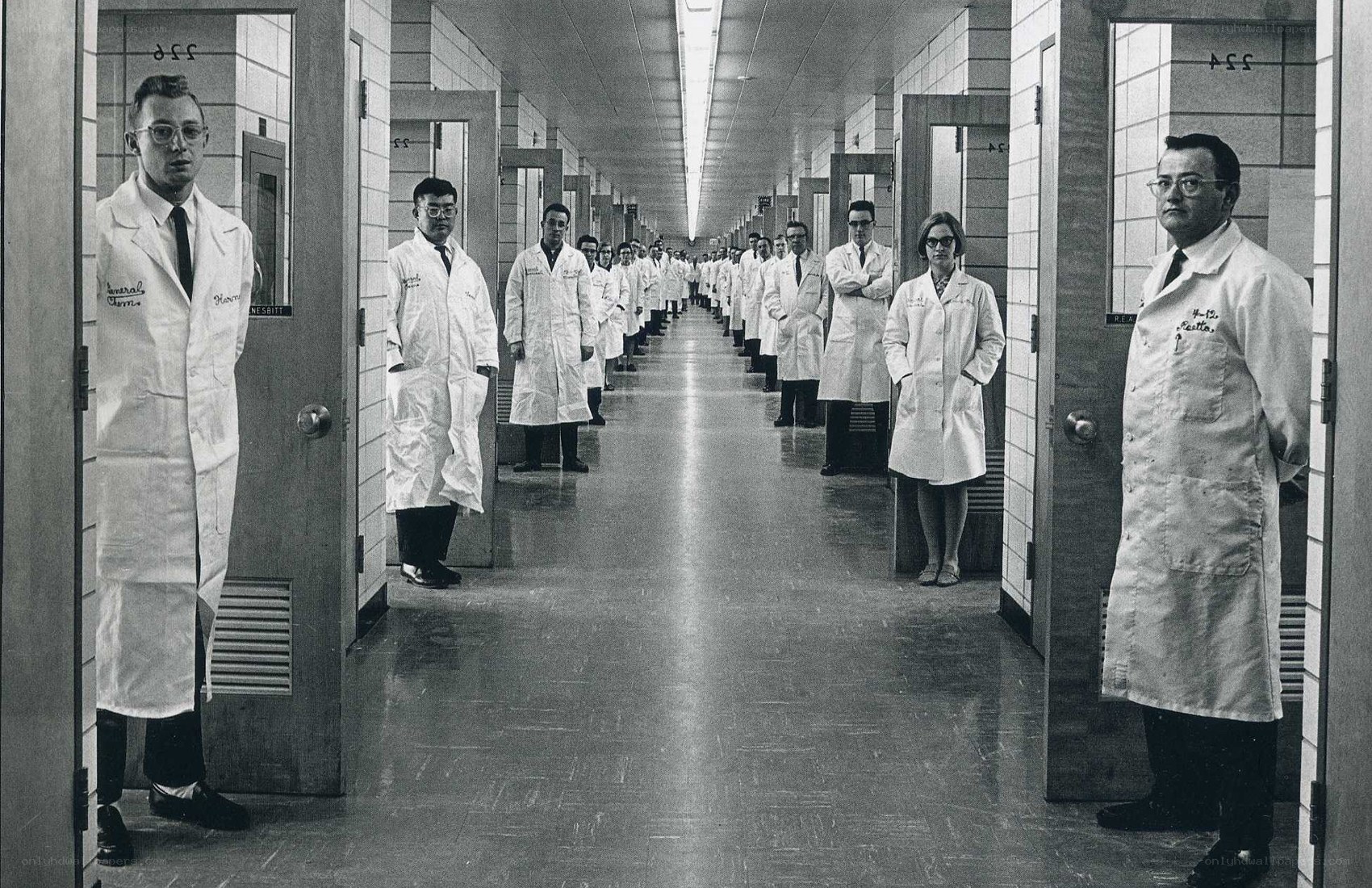Scientists in a lab corridor