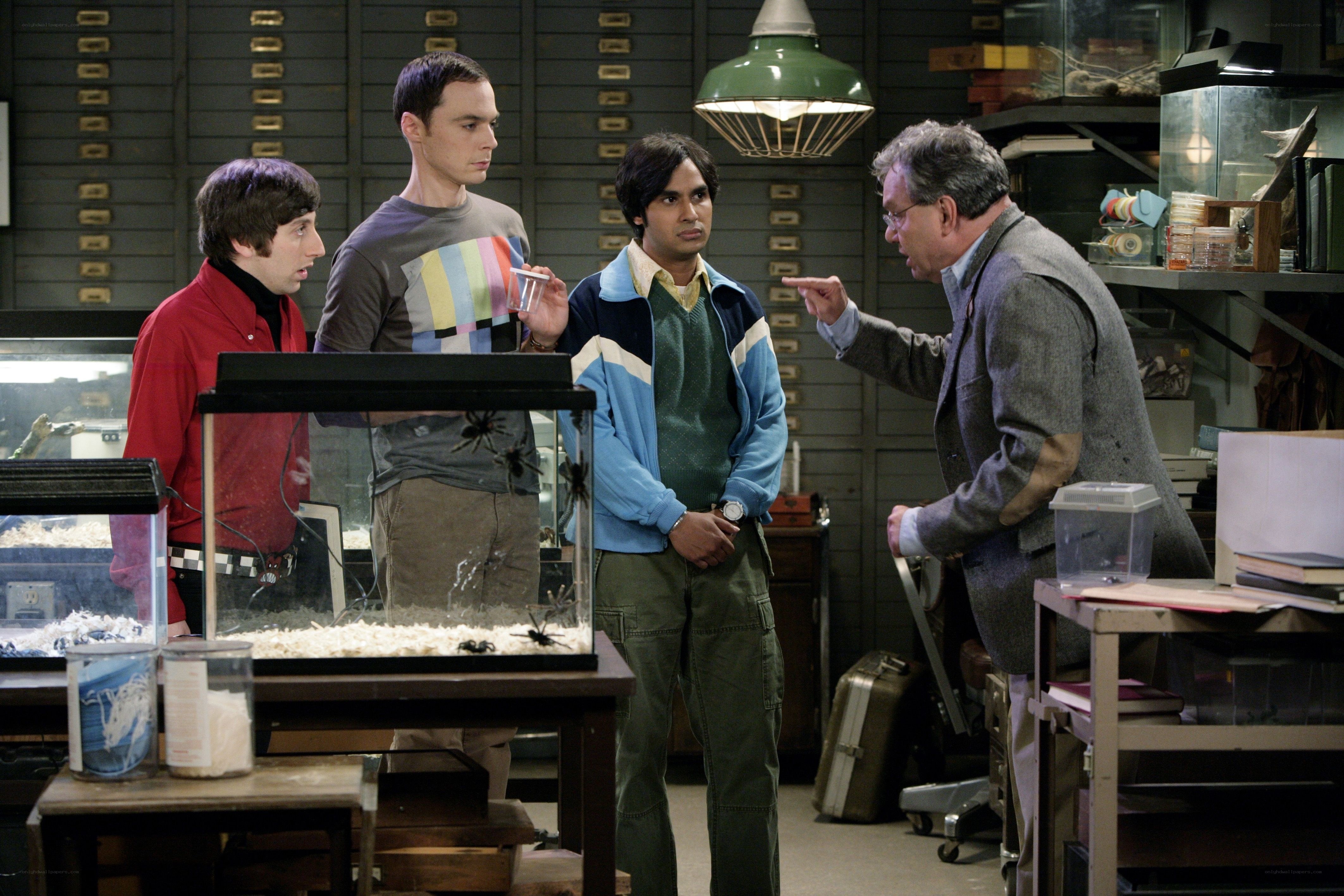 Scientists in a lab with spiders