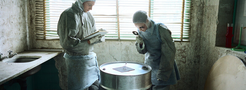 Scientists in protective suits