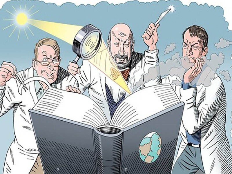 Scientists studying a book