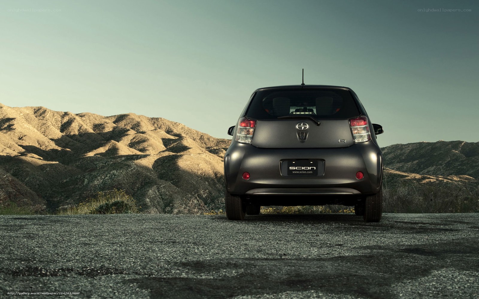 Scion iQ in desert landscape