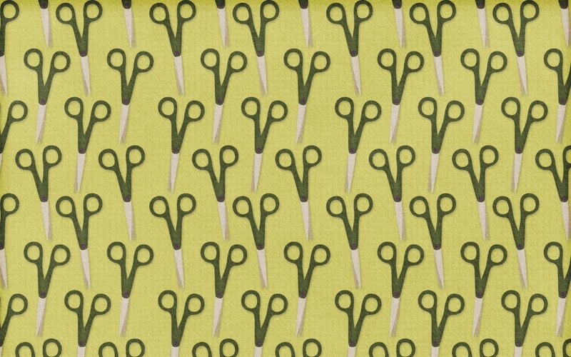 Scissors pattern on green fabric