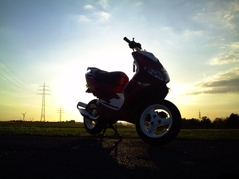 scooter at sunset