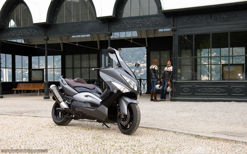 Scooter in front of a building