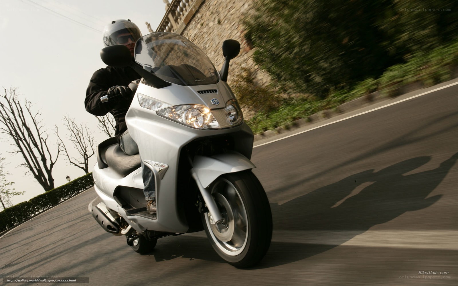 scooter rider on a road