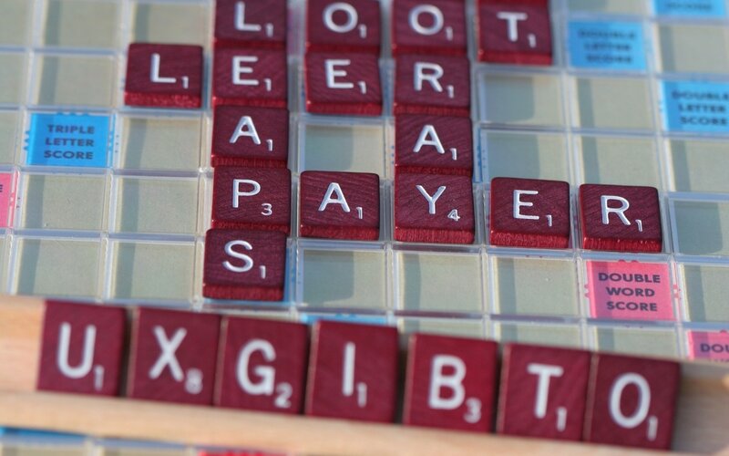 Scrabble Tiles on a Game Board