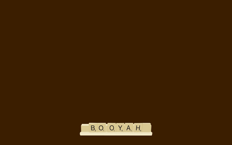 Scrabble tiles spelling BOOYAH