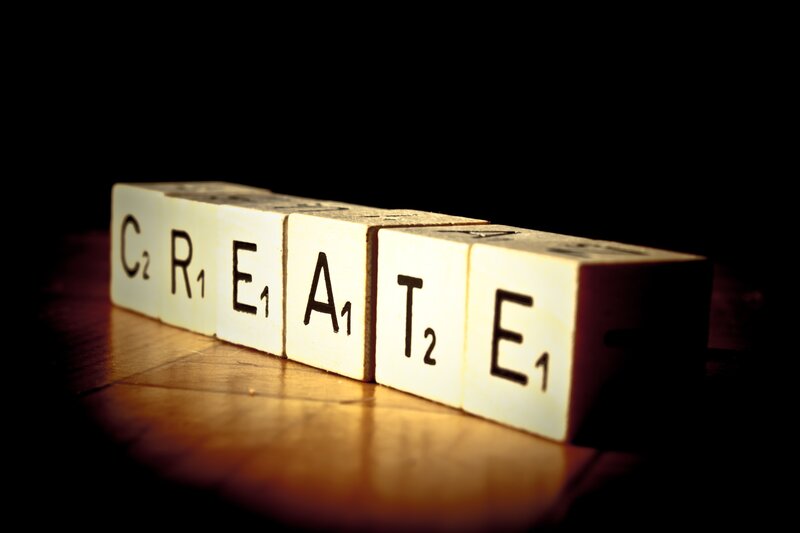Scrabble tiles spelling CREATE