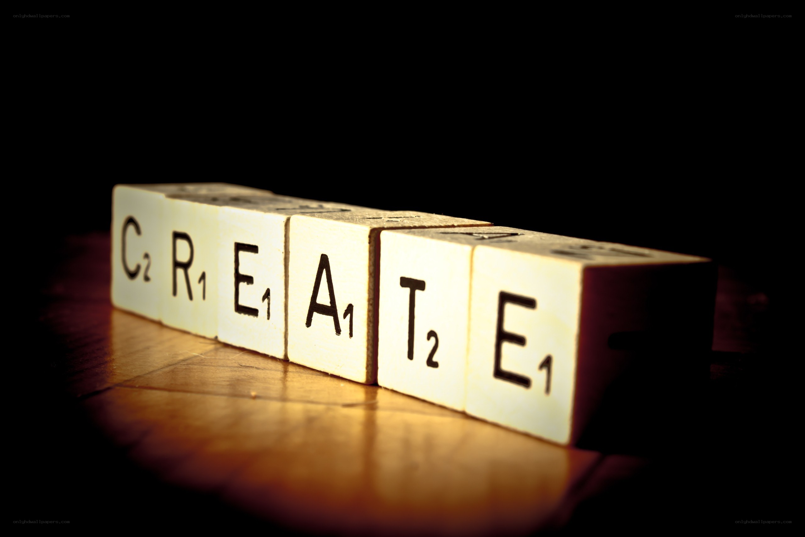 Scrabble tiles spelling CREATE
