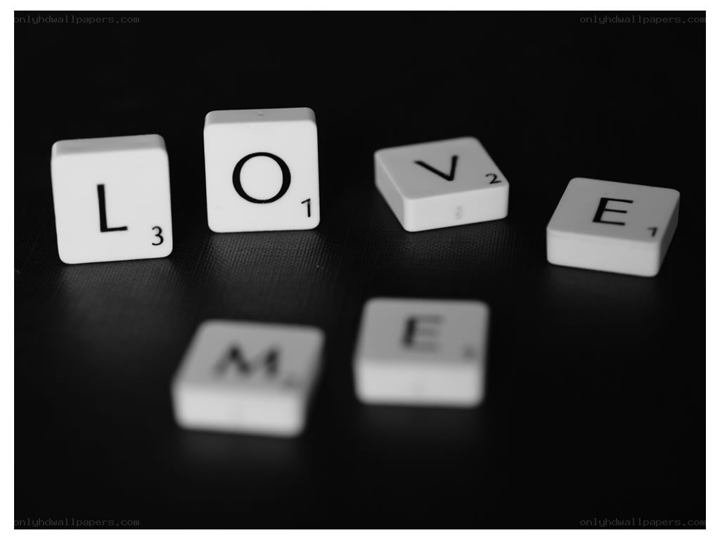 Scrabble tiles spelling LOVE