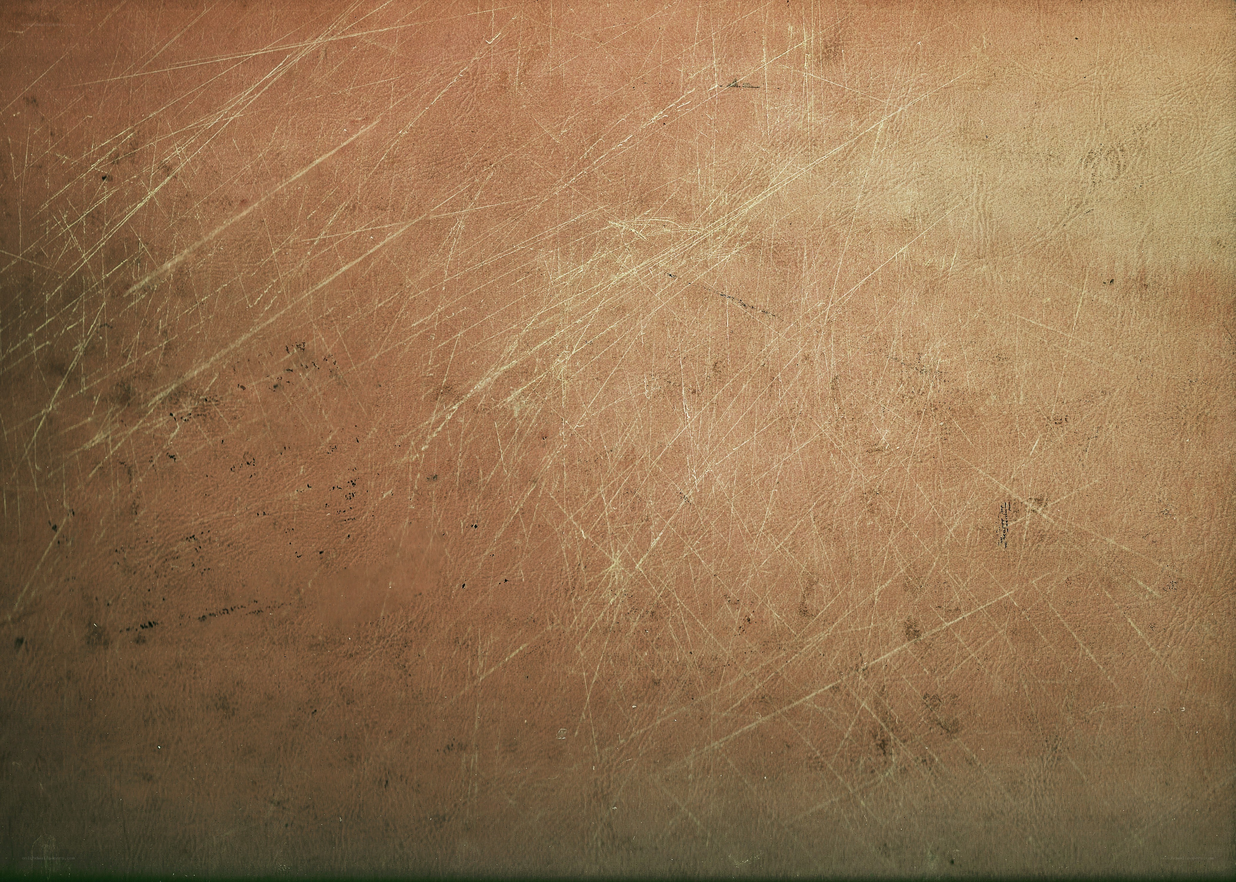 scratched brown leather surface