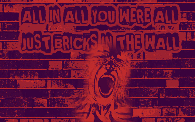 screaming face on brick wall