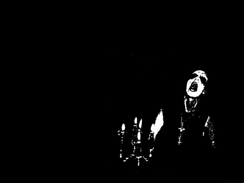 screaming figure with candles