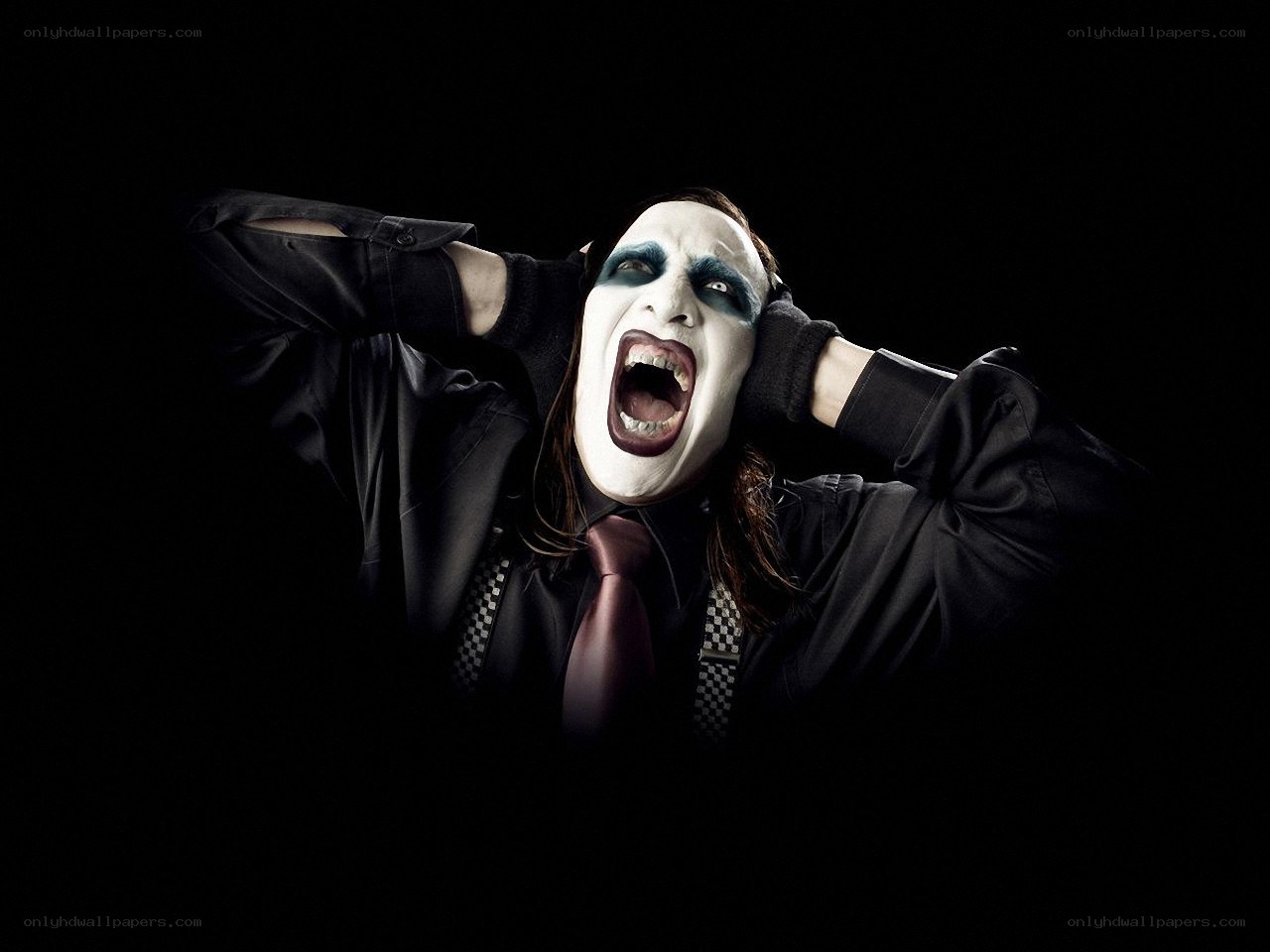 screaming man in white makeup
