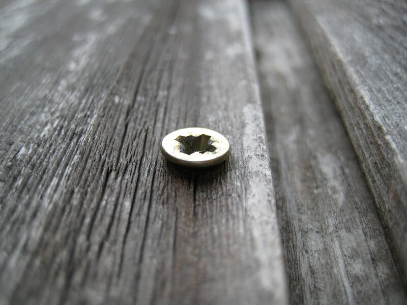 screw on weathered wood