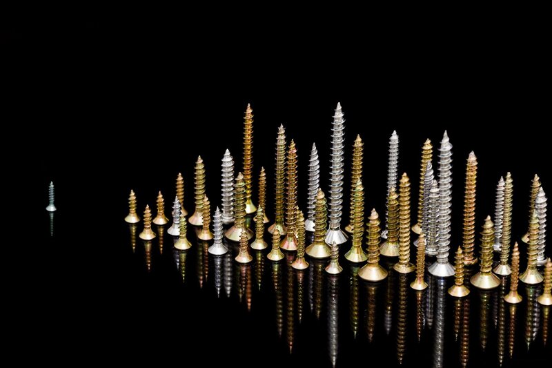 Screws on Black Surface
