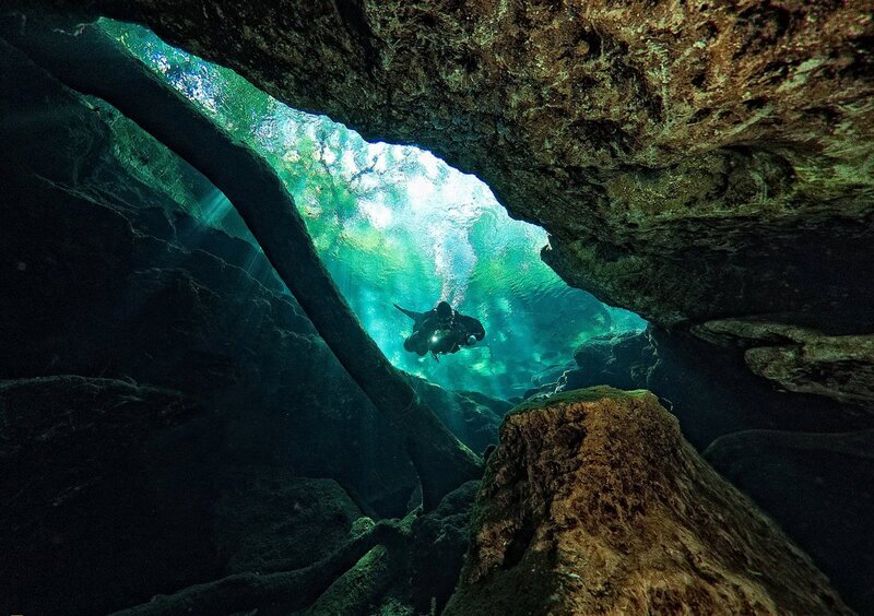 Scuba Diver in Cave — Green