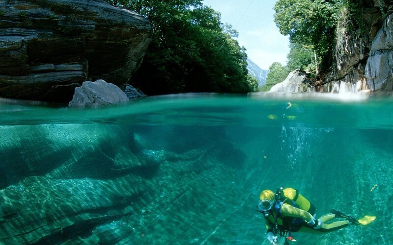Scuba diver in clear river