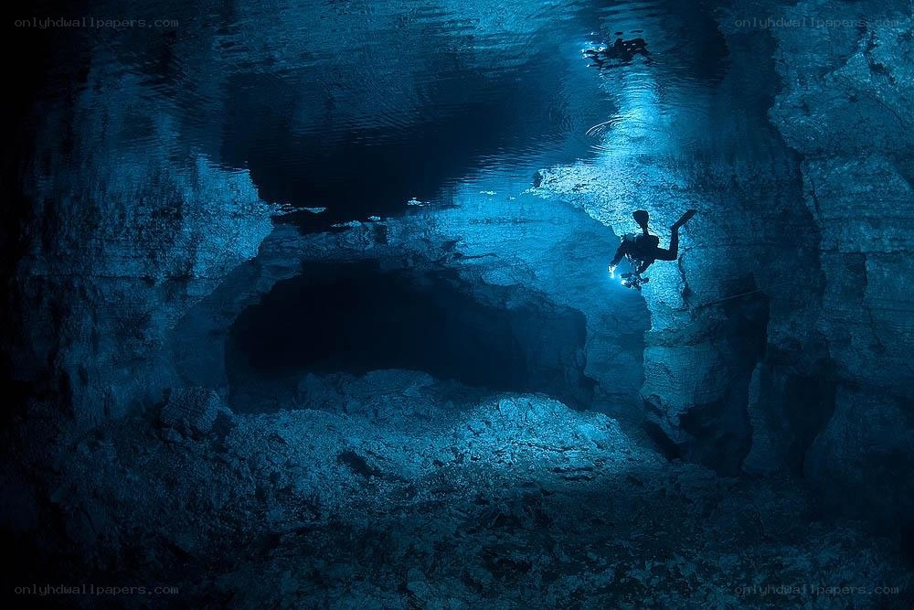 Scuba diver in underwater cave