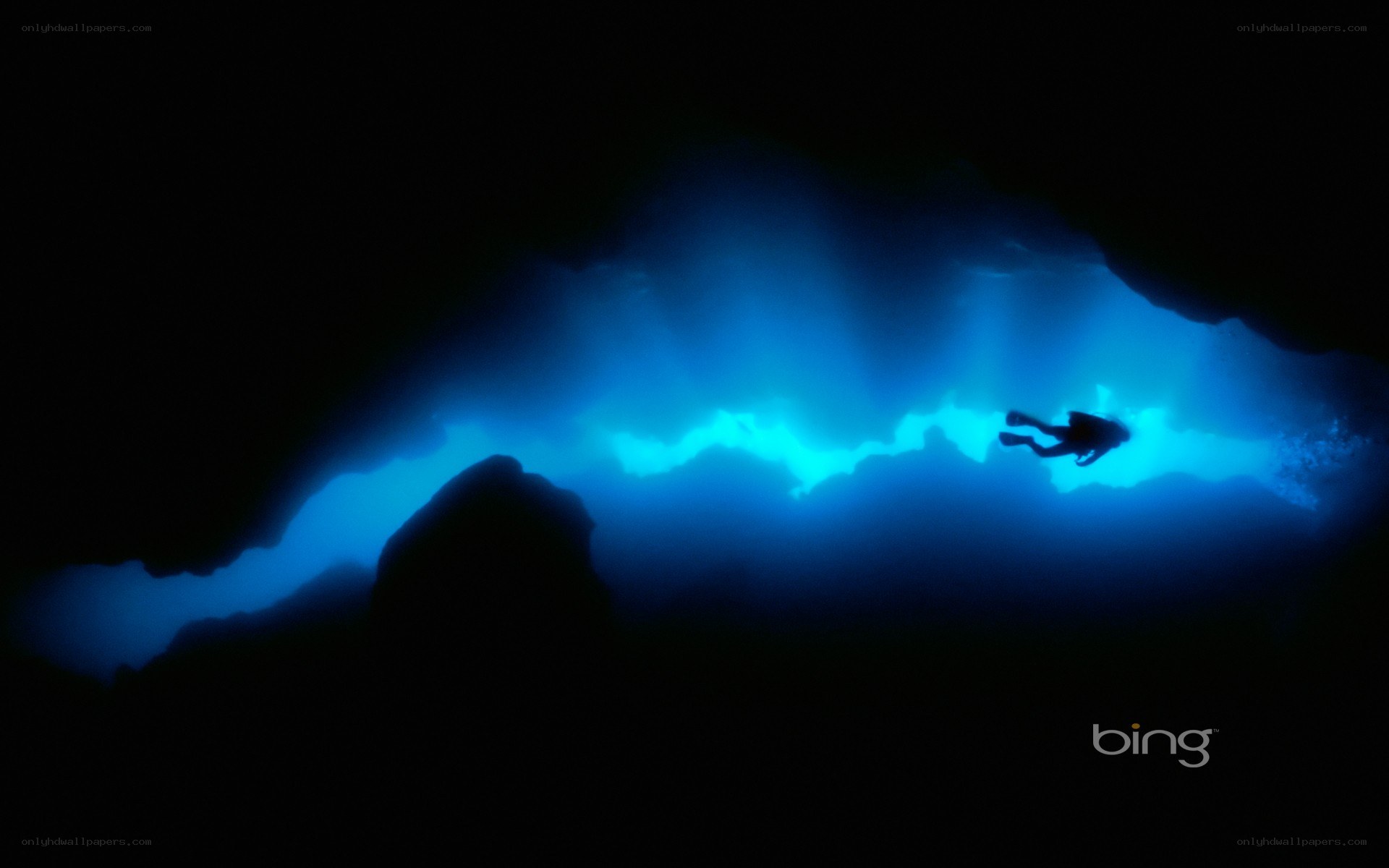 scuba diver in underwater cave