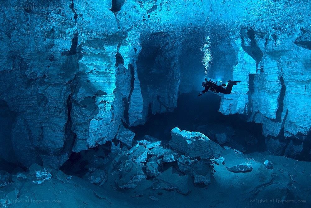 Scuba diver in underwater cave