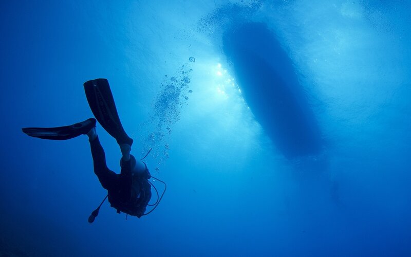 Scuba Diver Underwater — Photograph