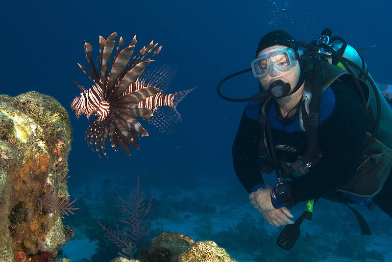 Scuba diver with lionfish