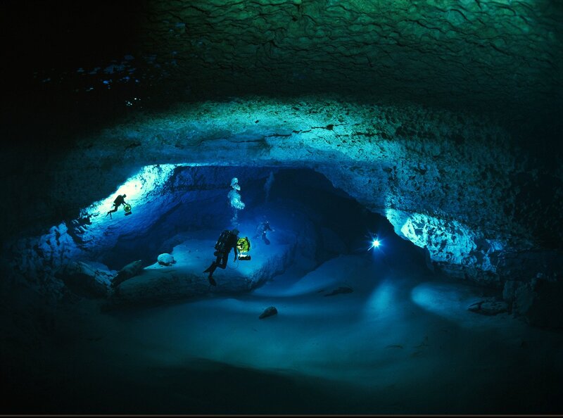 Scuba Divers in Cave — Blue, Dark