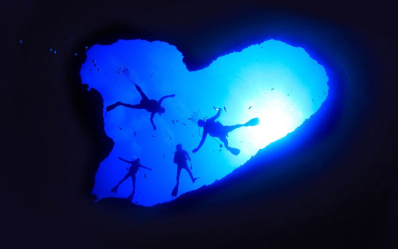 Scuba Divers in Cave — Blue, Dramatic